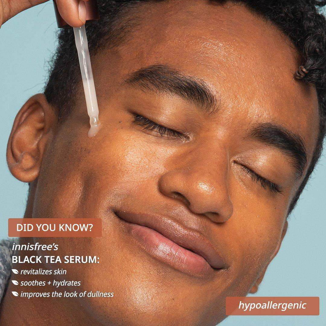 Man applying innisfree Black Tea Serum for hydrated, revitalized skin – hypoallergenic skincare