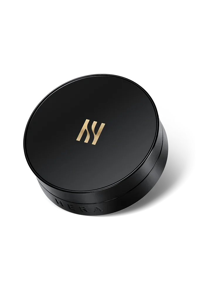 Luxury black HERA cushion compact with gold logo, elegant skincare makeup product