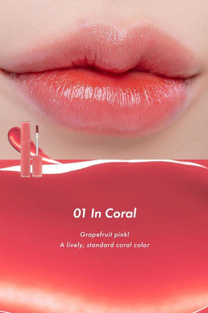 Glossy coral pink lips with 01 In Coral lip tint, grapefruit pink shade for radiant beauty