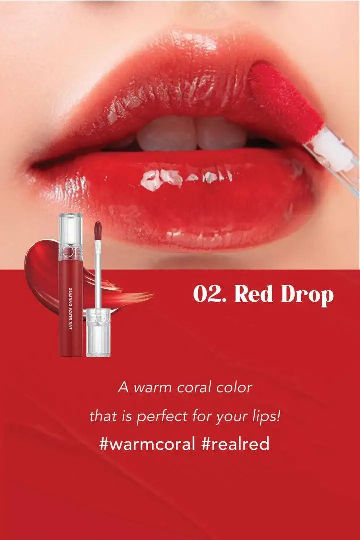 Red Drop warm coral lip tint being applied, glossy finish on lips, #warmcoral #realred