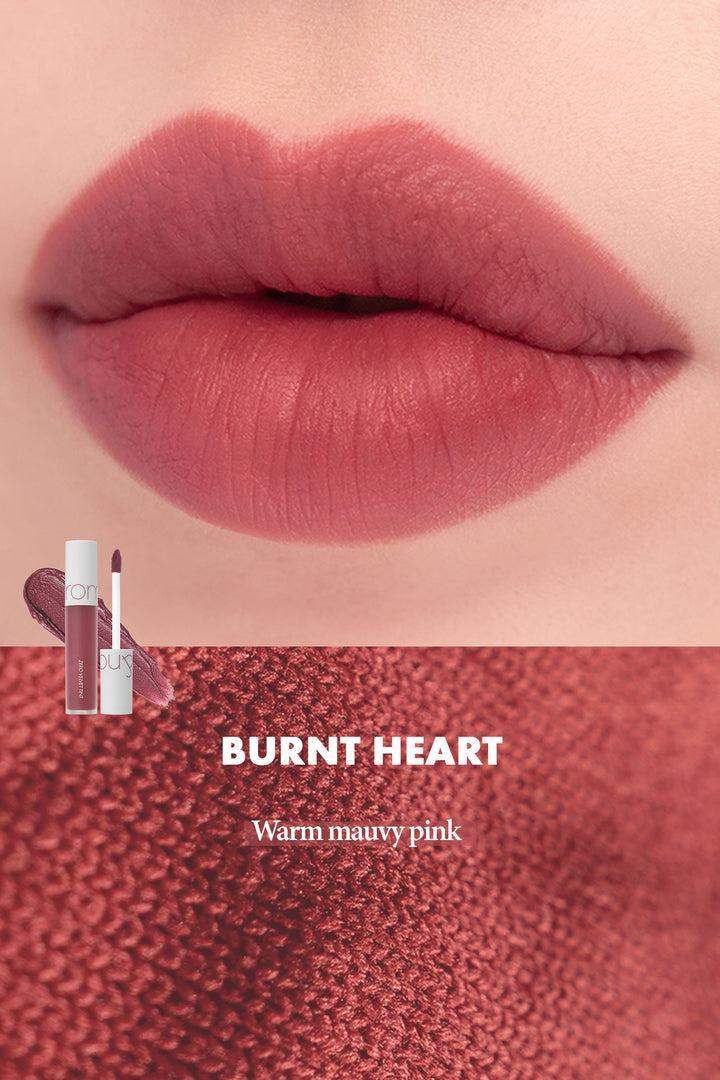 Burnt Heart warm mauvy pink liquid lipstick on lips, matte finish, beauty product swatch