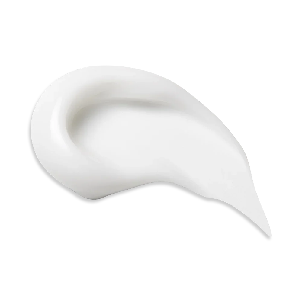 Smooth white skincare cream swatch on clean background for radiant skin routine