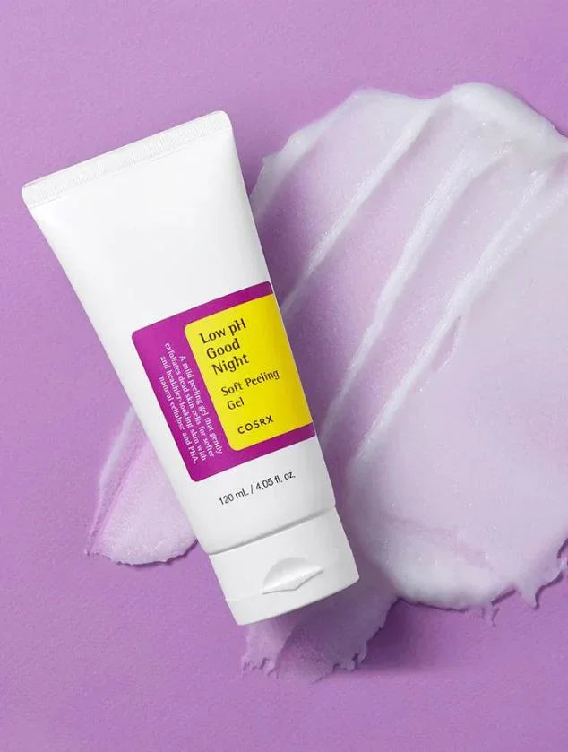Low pH Good Night Soft Peeling Gel by COSRX on purple background with creamy texture swatch