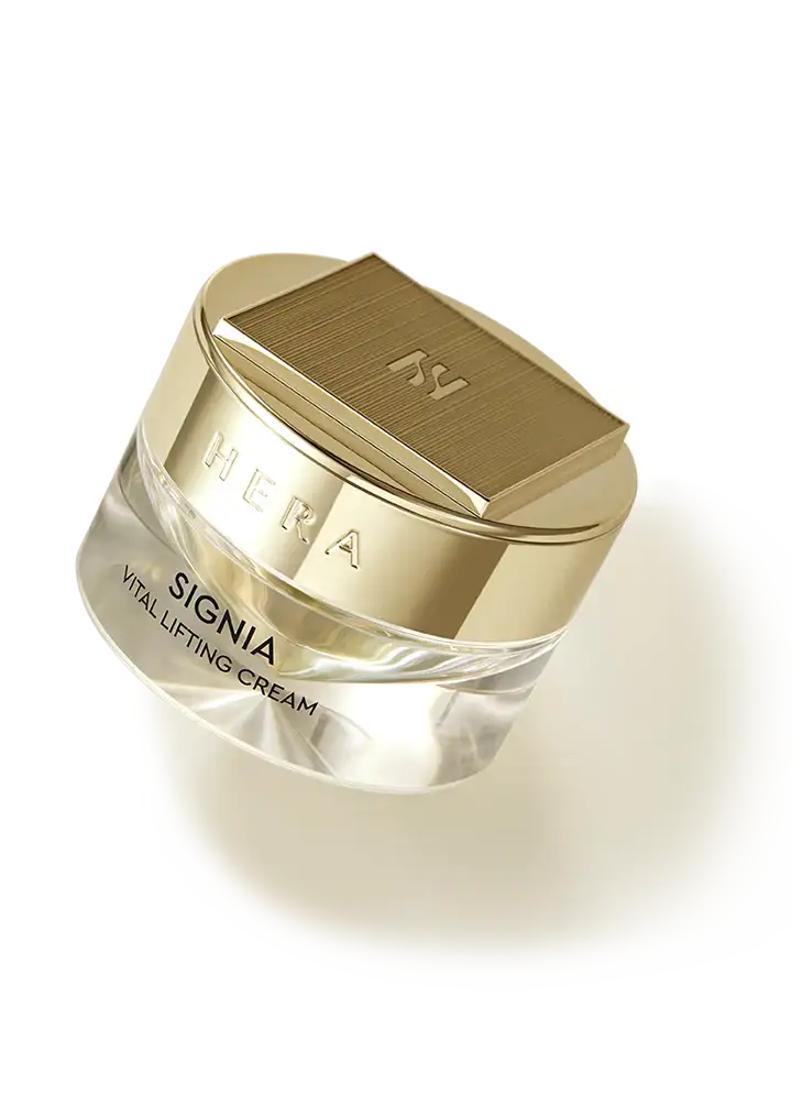 Hera Signia Vital Lifting Cream jar with gold lid, luxury skincare for radiant, firm skin