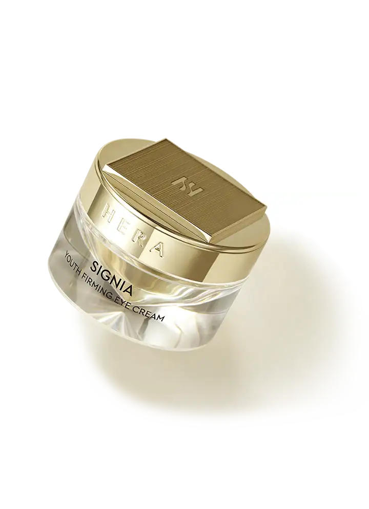 Hera Signia Youth Firming Eye Cream in luxury gold jar, anti-aging skincare for radiant eyes