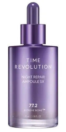 Purple glass bottle of Time Revolution Night Repair Ampoule 5X with dropper, featuring 77.2 Extreme Biome™ formula