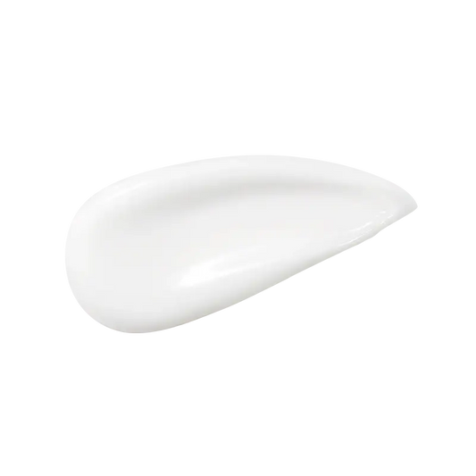 Smooth white skincare cream swatch on clean background for radiant wellness routines