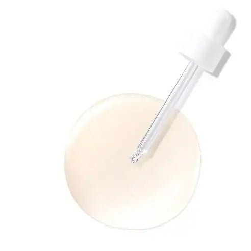 Skincare serum dropper with creamy texture, ideal for radiant skin and mindful wellness routines
