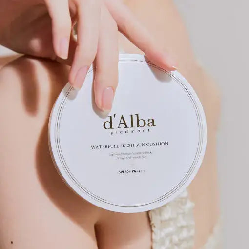 d'Alba Waterfull Fresh Sun Cushion SPF50+ PA++++ held in hand, lightweight vegan sunscreen for radiant skin