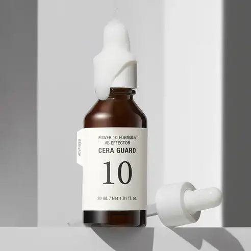 Cera Guard 10 serum bottle with dropper, minimalist skincare product for radiant wellness routine